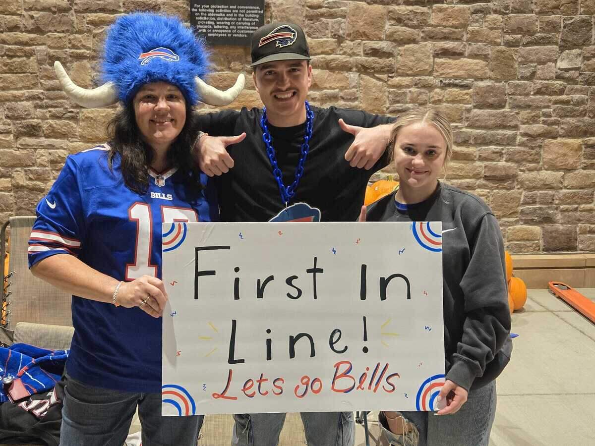 Decked out in Buffalo Bills gear, Kari Morris, Eski Kowalski and Selma Belic were the first group in line at Wegmans at 5 p.m. on Tuesday. They traveled from Lexington, S.C., for the celebration.