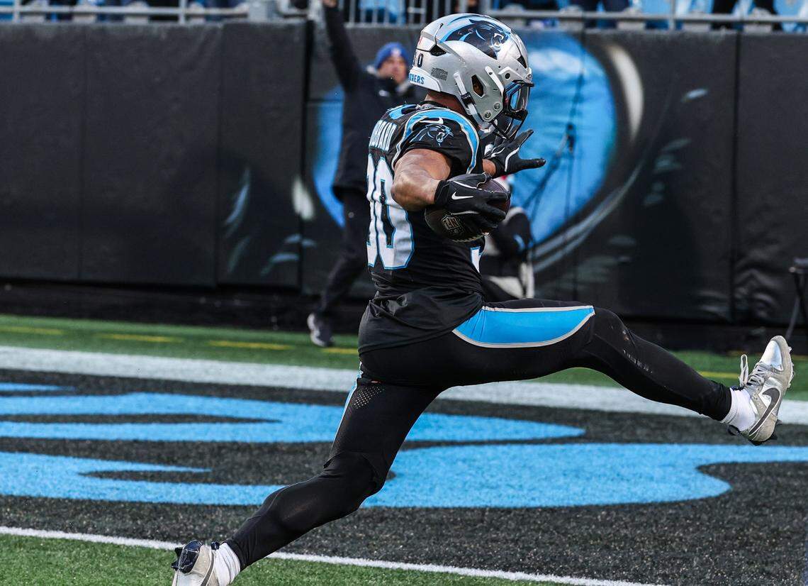 Carolina Panthers running back Chuba Hubbard high steps into the end zone for the game winning touchdown against the Arizona Cardinals at Bank of America Stadium in Charlotte, NC on Sunday, December 22, 2024.
