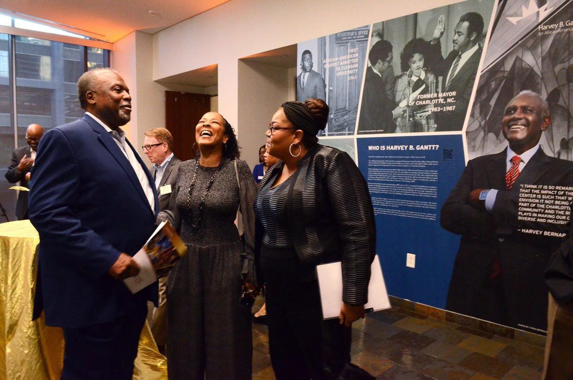 David Taylor, president and CEO of the Harvey B. Gantt Center for African-American Arts + Culture, mingles Tuesday after announcing plans for the Gantt Golden Year celebration next year.