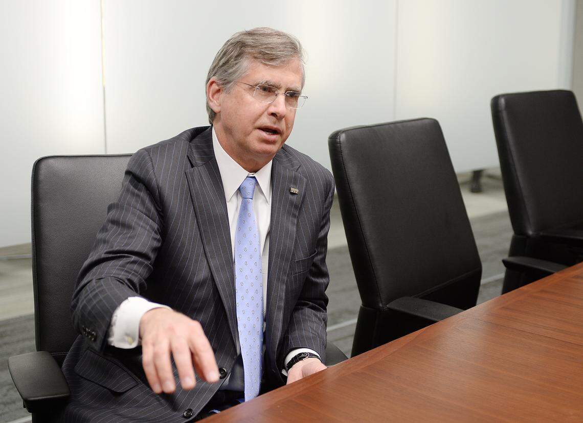 Bill Rogers, CEO of Truist, is finishing final touches of the merger of BB&T and SunTrust banks, including branding and signage in early 2022.