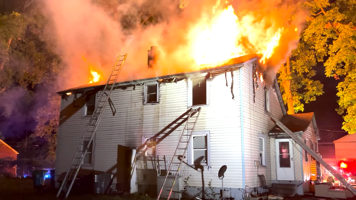 Charlotte firefighters battled a house fire early Thursday morning. Three firefighters were hospitalized with injuries.