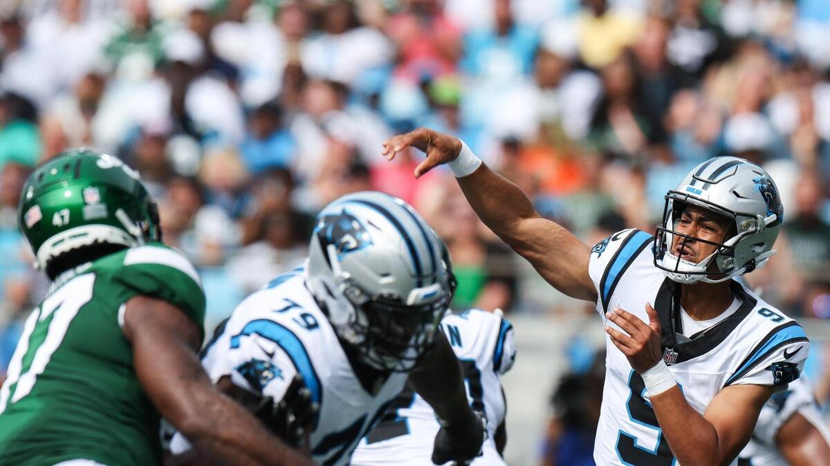 Panthers quarterback Bryce Young, far right, throws a pass during the pre-season game against the Jets at Bank of America Stadium on Saturday, August 12, 2023 in Charlotte, NC.