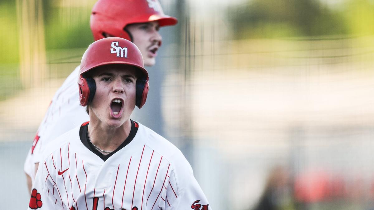 South Mecklenburg Sabres Chase Bremer celebrates after making a run against the Myers Park Mustangs at South Mecklenburg High School in Charlotte, N.C., on Tuesday, April 23, 2024.