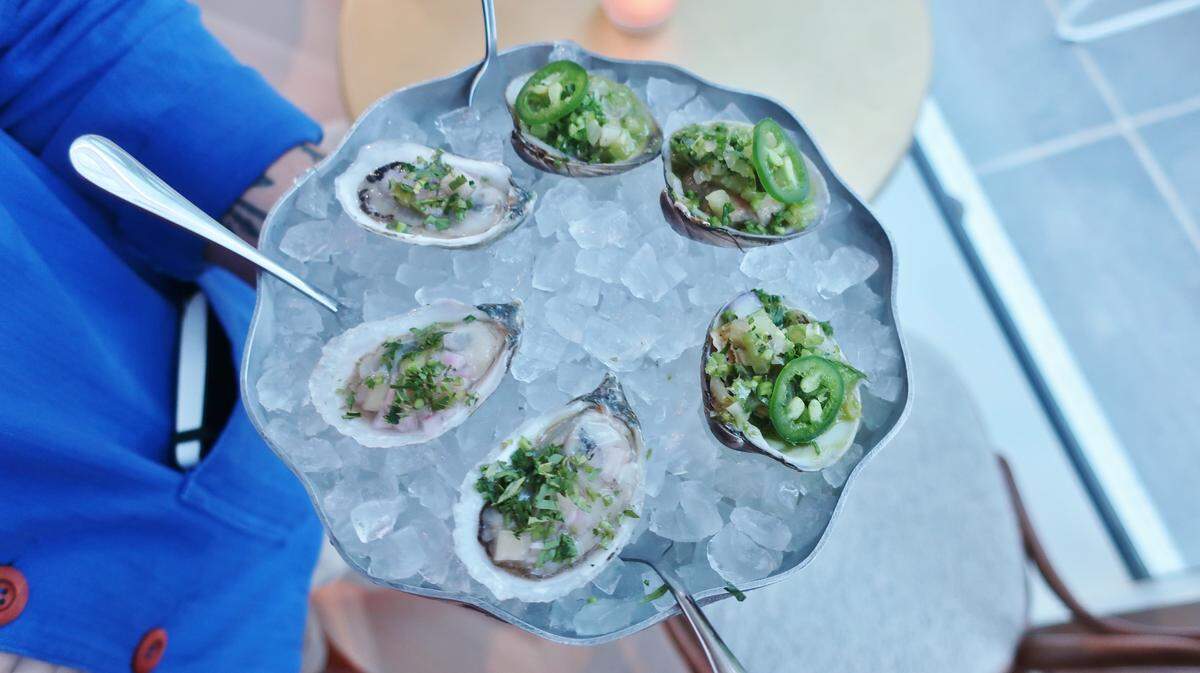 Albertine offers a selection of chilled seafood such as N Sea Oyster Co. oysters on the half shell with mignonette and Sapelo Island clam escabeche with Pedro Jimenez potlikker and sofrito.