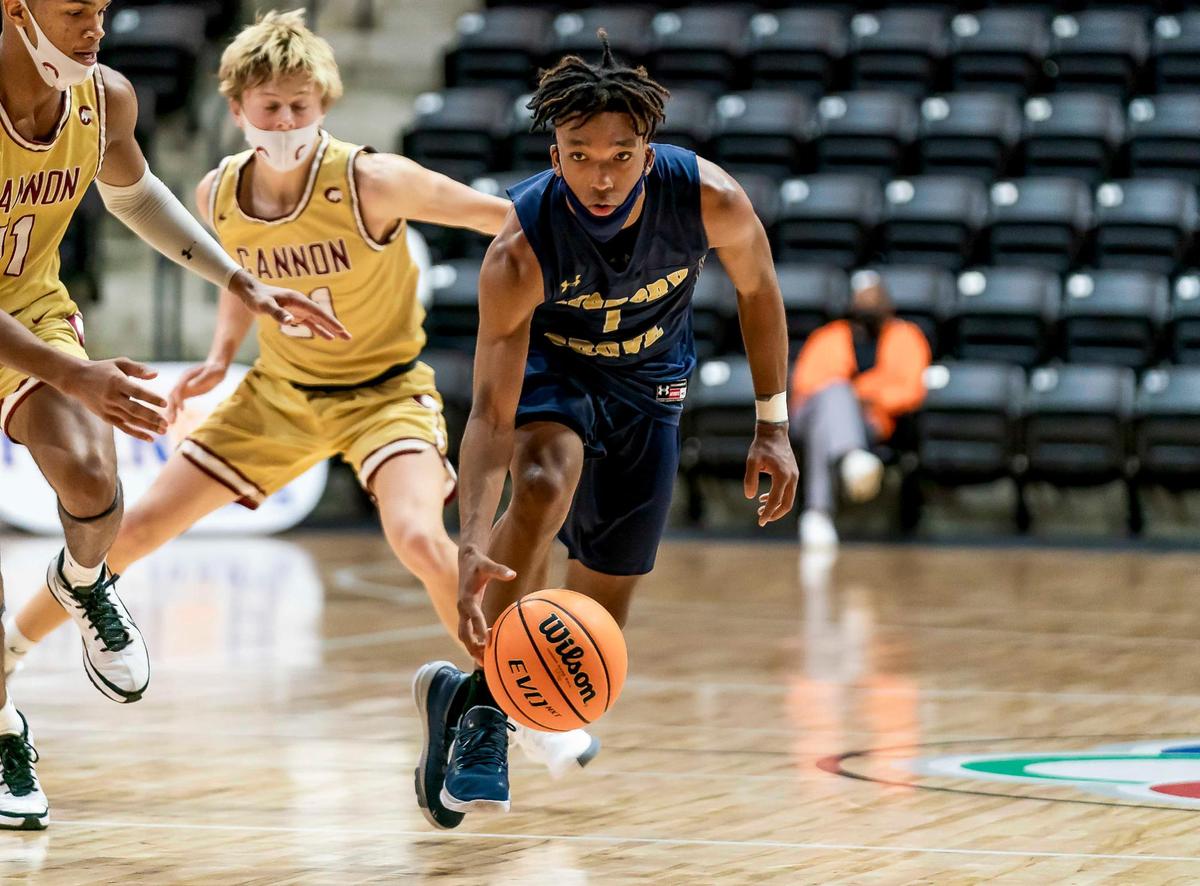 Hickory Grove’s DJ Cuttion (1) drives to the basket at the Phenom Holiday Classic Wednesday December 23, 2020.