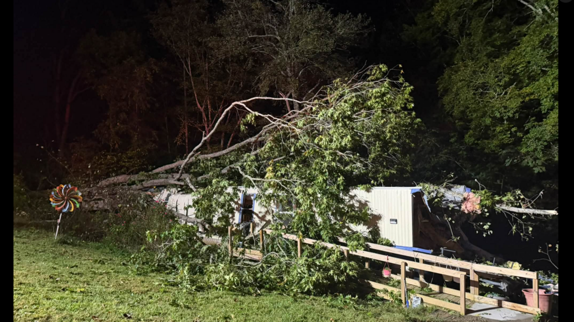Fallen tree pins 2 people in their home, then it starts burning, NC rescuers say