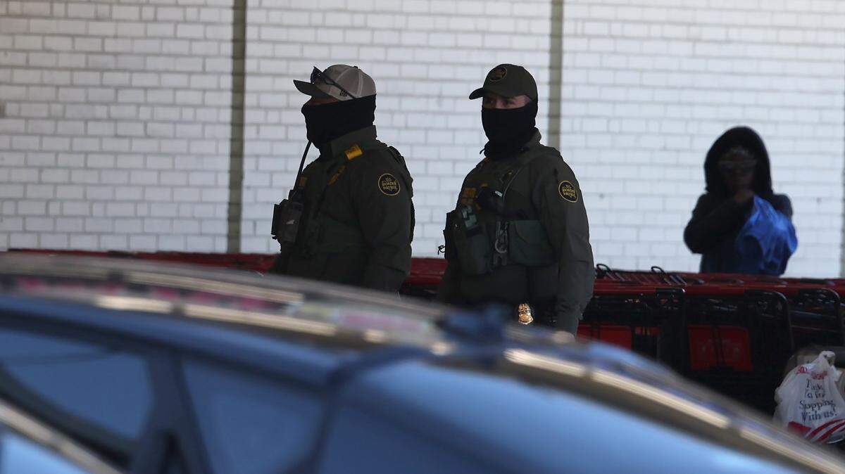 U.S. Border Patrol agents arrive at the Compare Foods on North Tryon Street in Charlotte on November 17, 2025.
