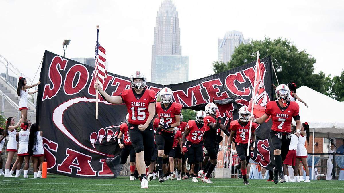 South Mecklenburg takes the field at the newly renovated American Legion Memorial Stadium in Charlotte on Thursday, Aug. 19, 2021, ahead of its game against Charlotte Catholic.