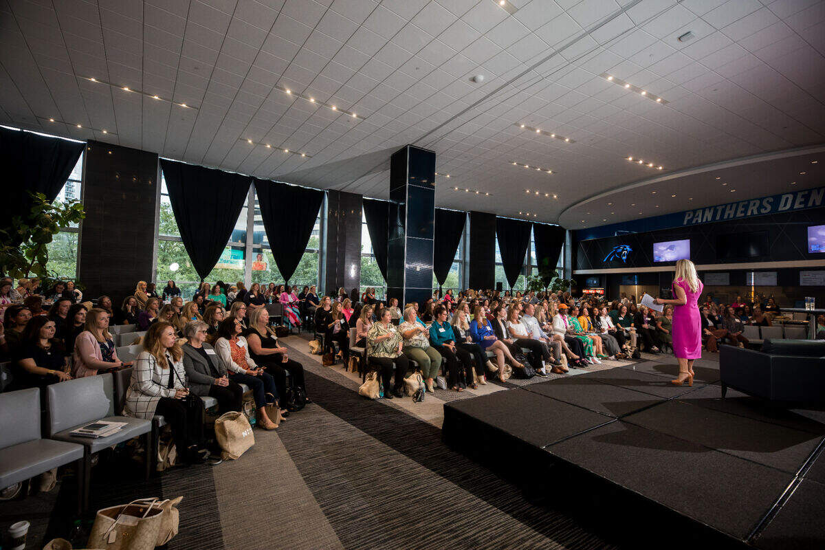 Molly Grantham addresses the crowd at her Bet On Yourself Summit on Sept. 17 in Charlotte.