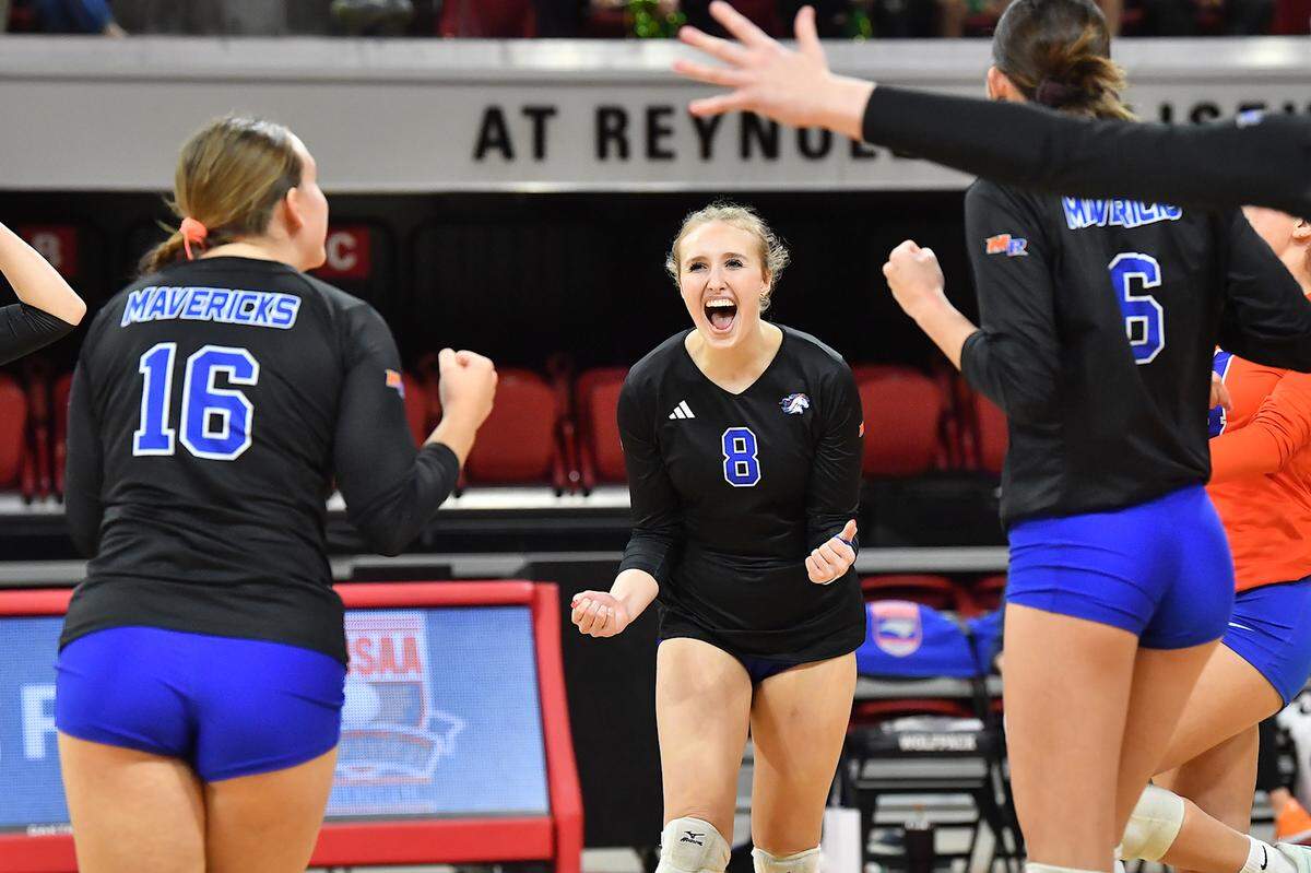 Marvin Ridge’s Ashley Murray (8) celebrates with teammates after winning a point against Cardinal Gibbons. The Marvin Ridge Mavericks took on the Cardinal Gibbons Crusaders in the NCHSAA 4A Volleyball Championship match in Raleigh, N.C. on November 2, 2024.