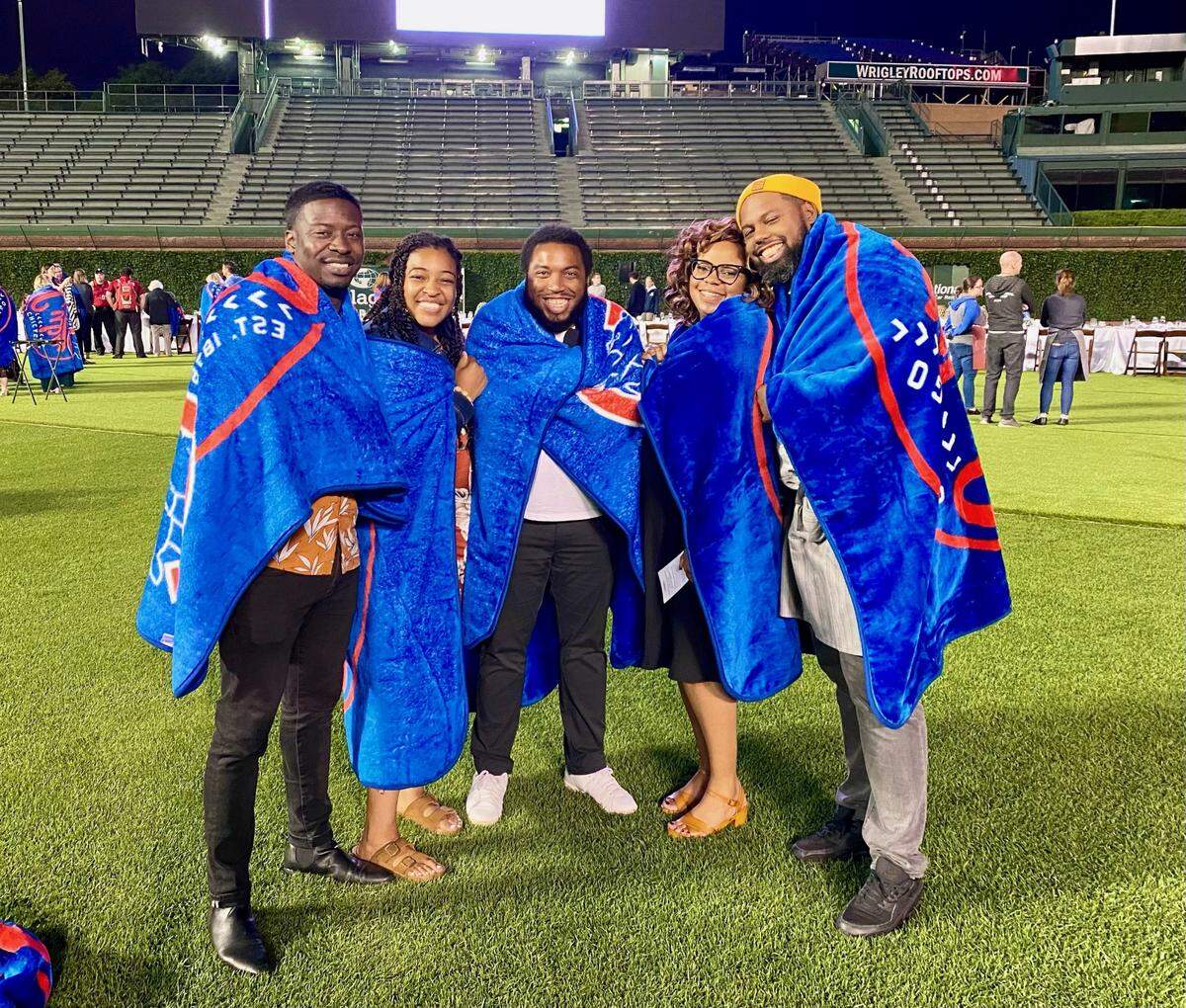 Leah & Louise team members at Wrigley Field for the event included mixologist Justin Hazelton (from left), co-head chef Courtney Evans, co-head chef Brandon Staton, co-owner Subrina Collier and chef/co-owner Gregory Collier.
