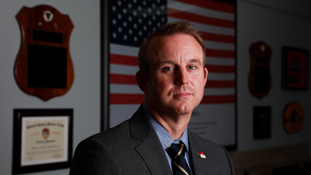 Dan Redford, president of the local Fraternal Order of Police, stands for a portrait at FPO Lodge #9 in Charlotte on May 3, 2024.