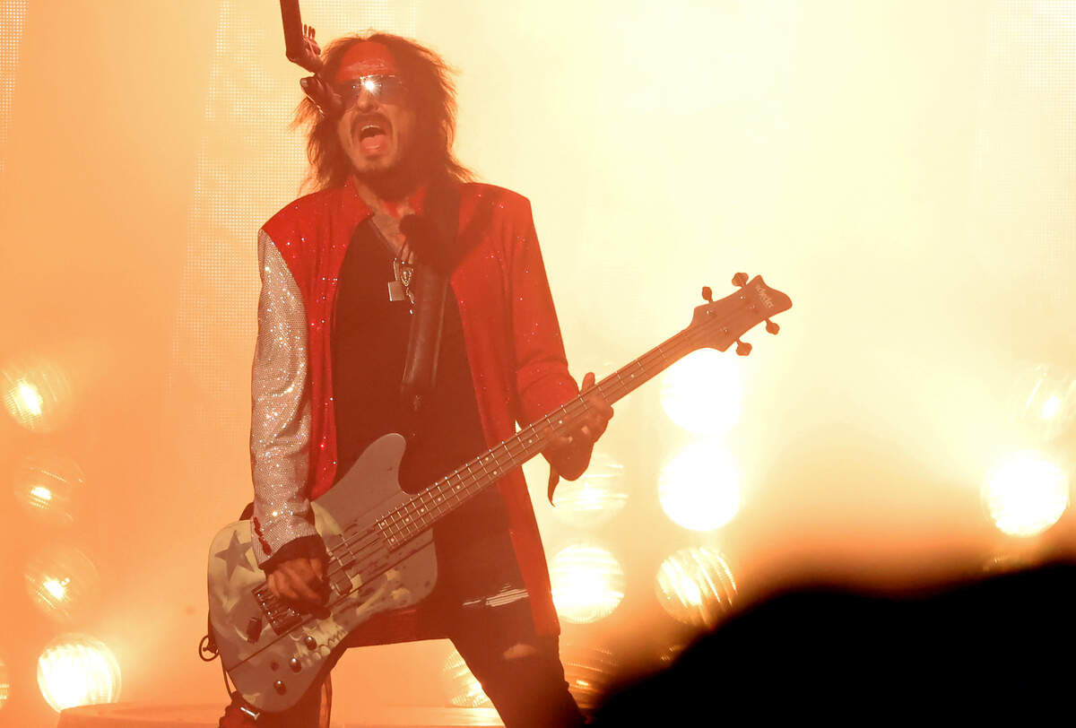 Mötley Crüe bassist Nikki Sixx performs during “The Return of the Carnival of Sins” tour at Truliant Amphitheater in Charlotte on Monday night.