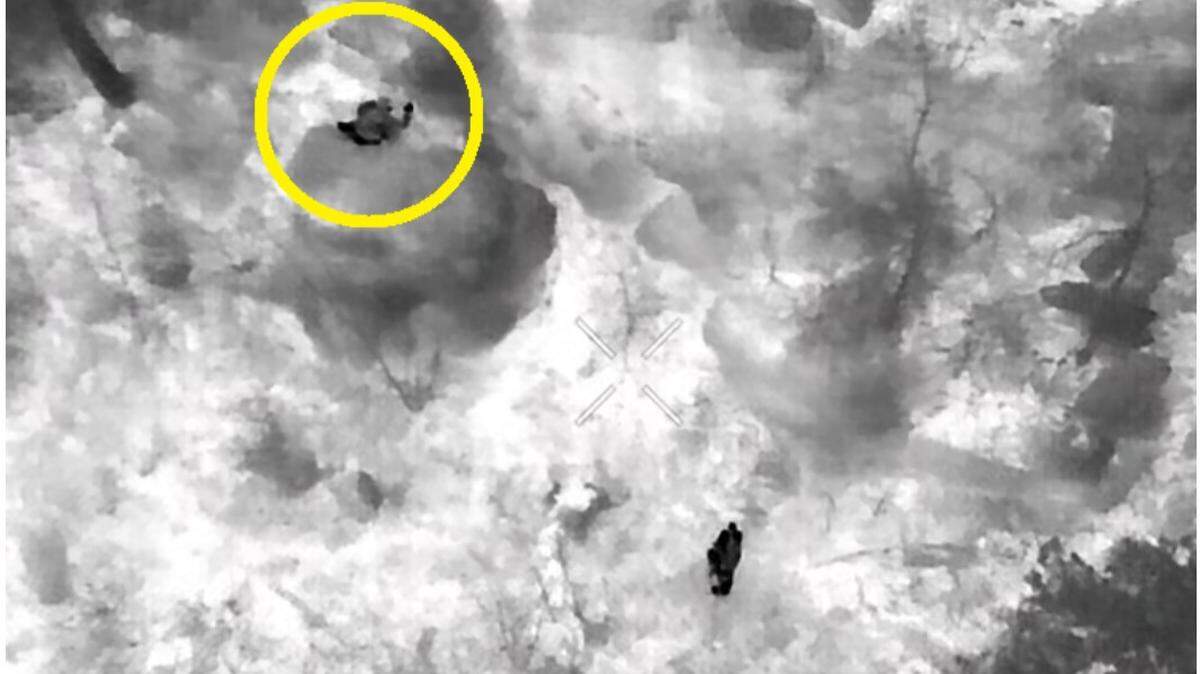 A Gaston County Police Department drone, in circle at top left, nears a lost hiker on Crowders Mountain in Gaston County, NC, on Monday night, Feb. 3, 2025.