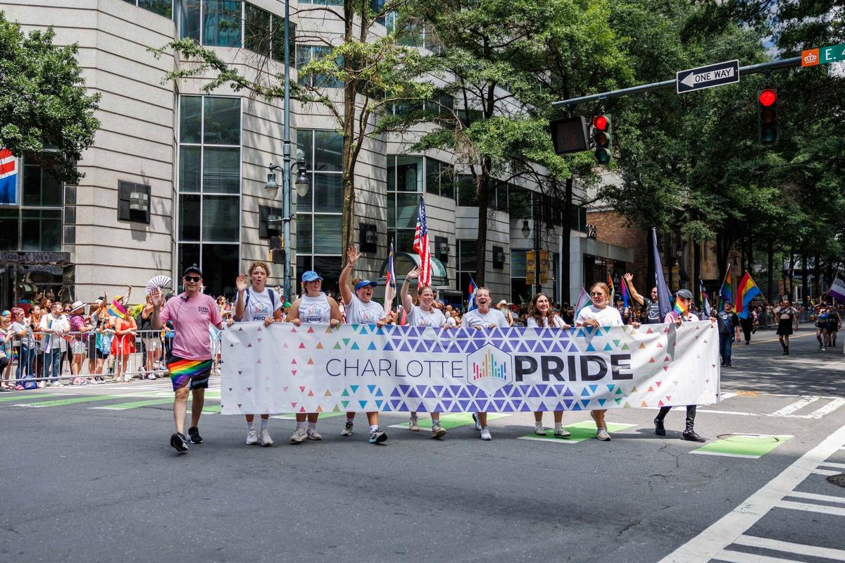 Festival volunteers kick off the during the Charlotte Pride Festival & Parade on Sunday, Aug. 18, 2024