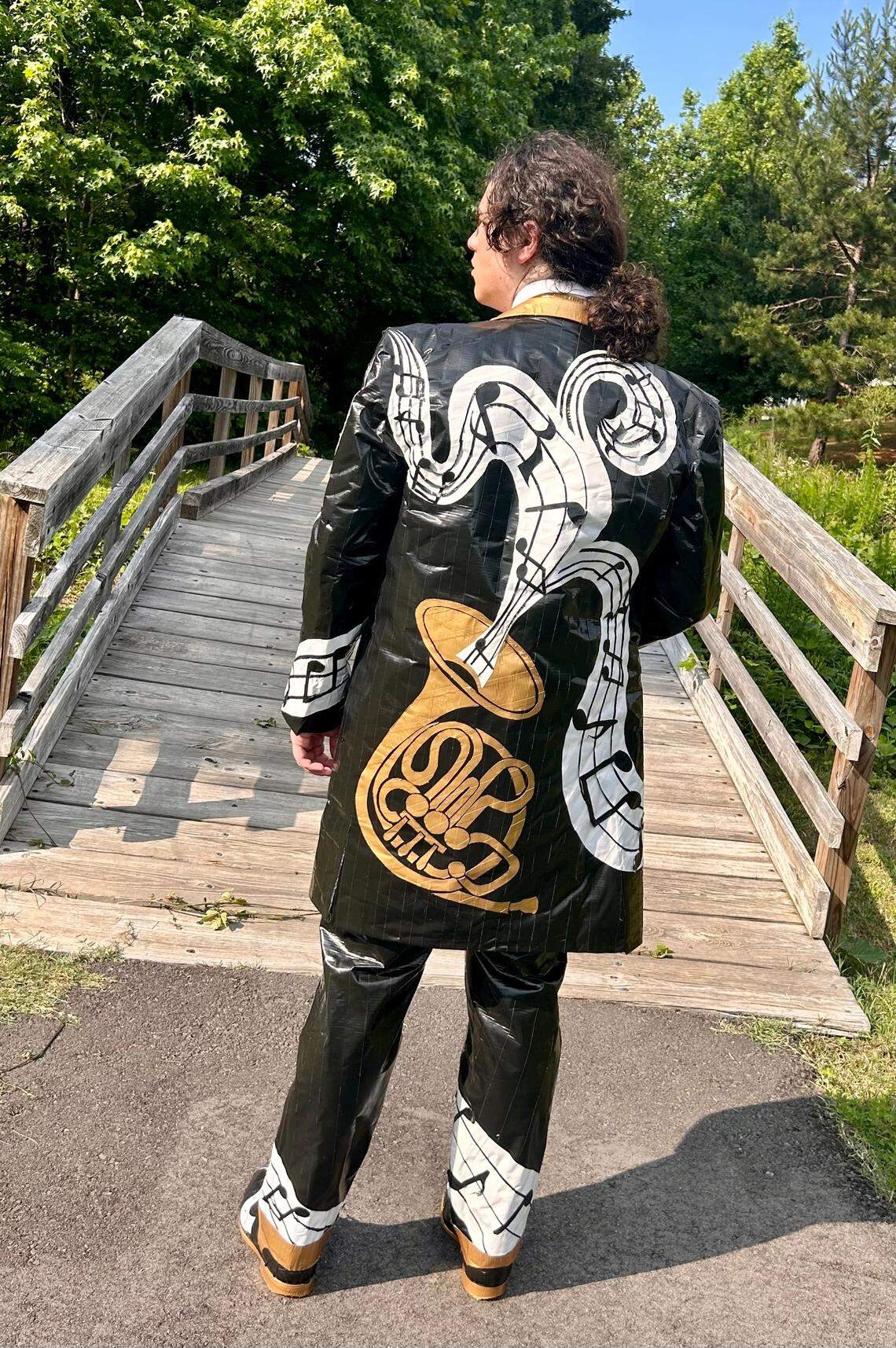 Pictured is the back of Nicholas Moore’s marching band-inspired Duck Brand duct tape prom tuxedo.