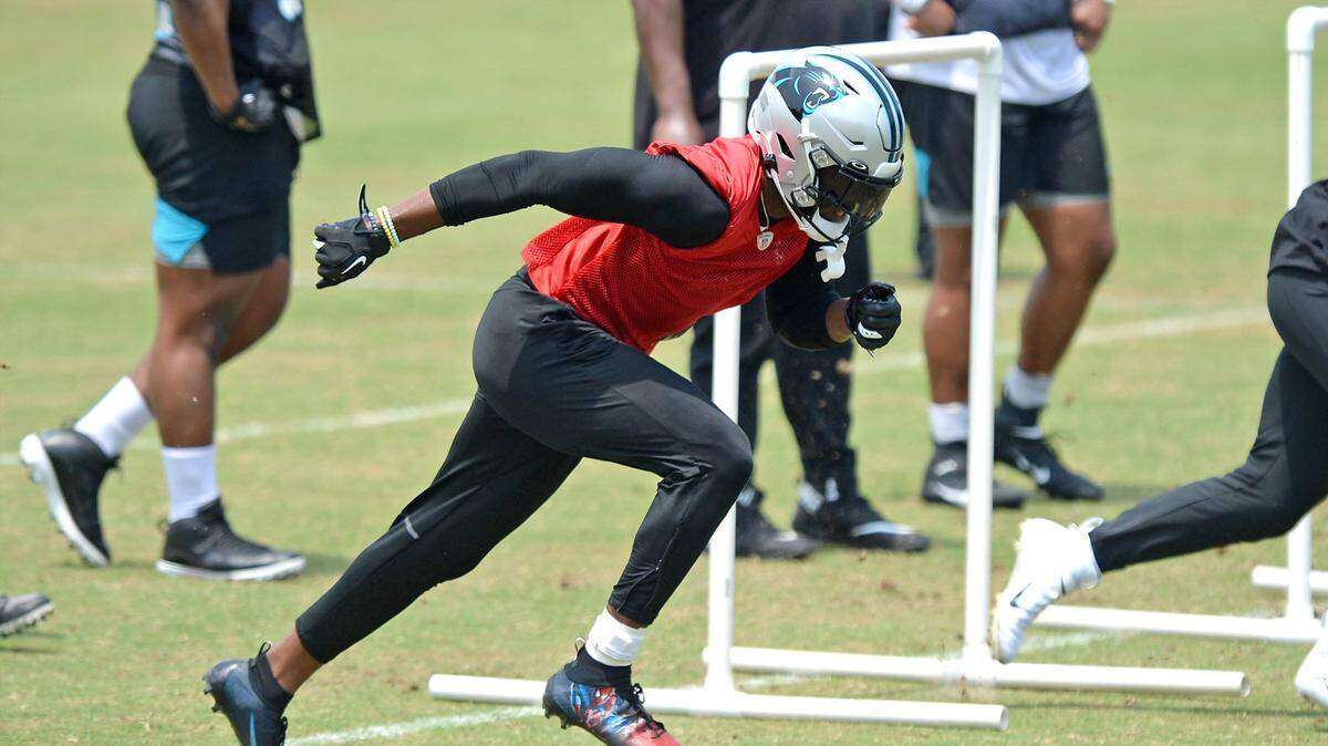 Carolina Panthers defensive end Brian Burns breaks off the line during the team’s OTA practice on May 25, 2021.