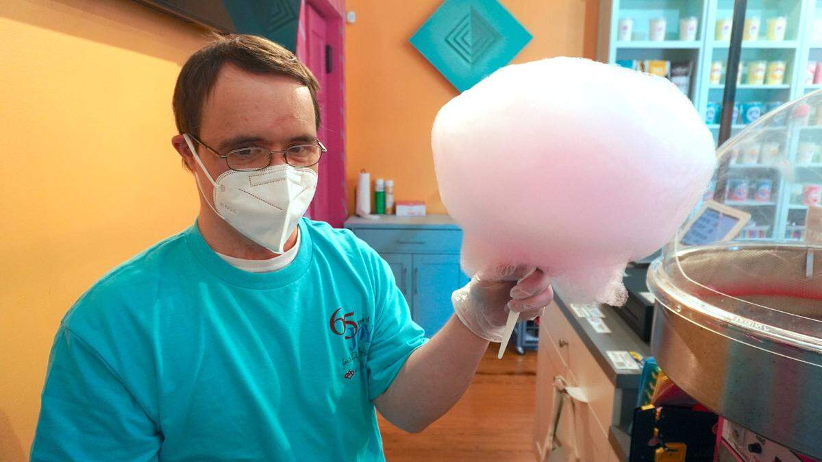 The regular crew members at the Cotton Candy Factory, next door to Cherubs Cafe in Belmont, are spinning cotton candy for the first time in more than a year.