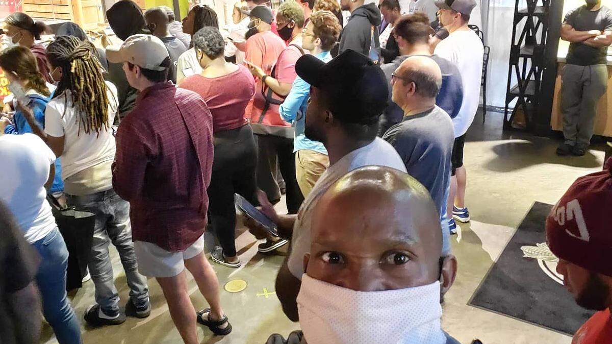LeMond Crayton-Hart, who drives for Door Dash, encountered long lines, extremely long wait times and a lack of social distancing at Sabor restaurants and Cabo Fish Taco on Tuesday night.