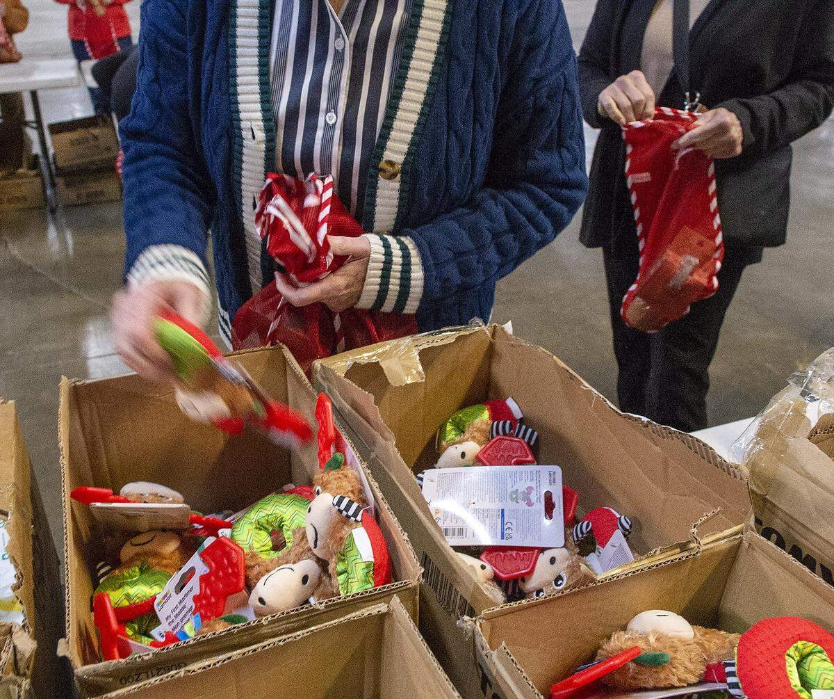 About 40 members of the Salvation Army's Women's Auxiliary group stuffed stockings with toys and other items for their Angel Tree program. The Salvation Army of Greater Charlotte's Angel Tree program matches children in need with anonymous donors who buy them presents for Christmas and provides senior citizens with gifts. In cases where donors didn't step up, Charlotte Observer readers cover the expense by giving to the Empty Stocking Fund. The Observer has sponsored the Empty Stocking Fund since about 1920. We photographed the stocking stuffers on Tuesday, Nov. 18, 2025.