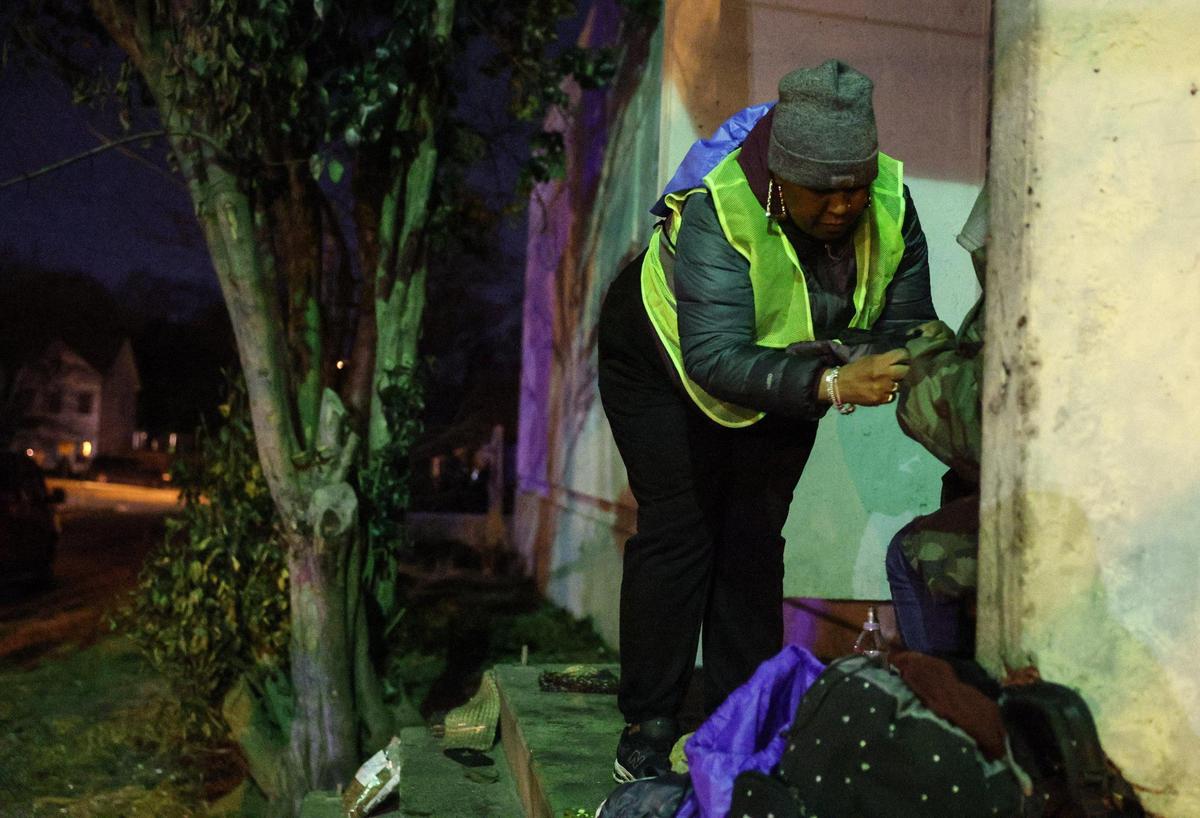 “Her hands were freezing,” said team leader Deb Phillips after helping a 32-year-old woman put on a pair of gloves during the point in time count in Charlotte.