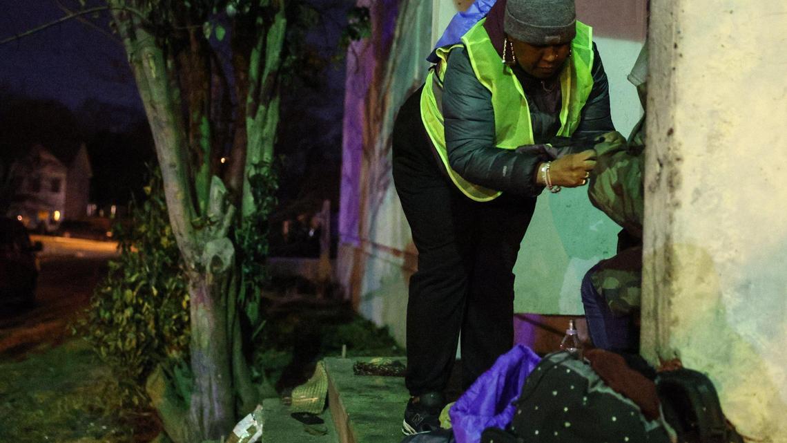 “Her hands were freezing,” said team leader Deb Phillips after helping a 32-year-old woman, who spent the night outside, put on a pair of gloves during the Point-In-Time Count in Charlotte on Thursday.