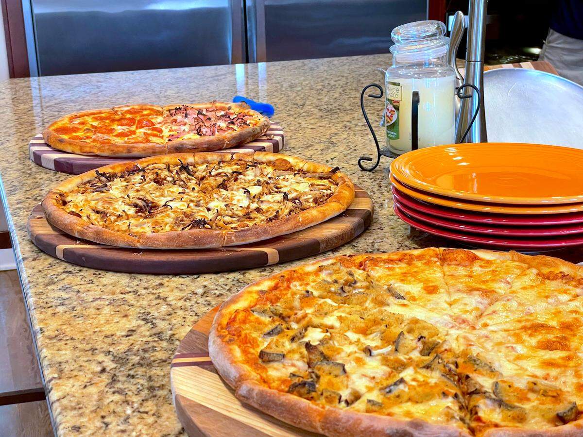 Fridays are homemade pizza night at the Paventi house in Davidson, North Carolina. David Paventi owned a pizza restaurant in Charlotte in the early 2000s, which is why the pies look so professional.