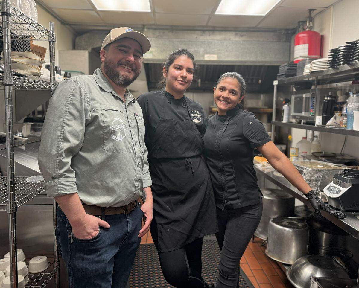 Manager Michel Meza Chacon, cook Anais Parra and chef Ana Suarez at Los Chamos restaurant in Charlotte.