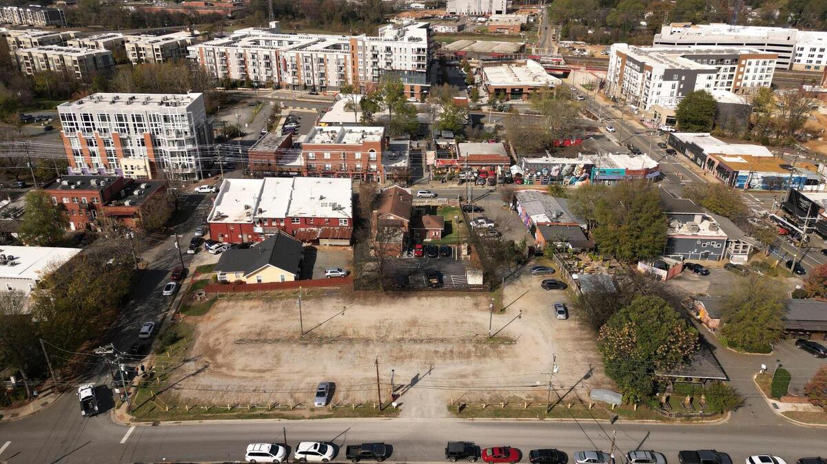 A parking lot in the heart of NoDa recently sold to Flywheel Group and could become the site a future mixed-use development in Charlotte.