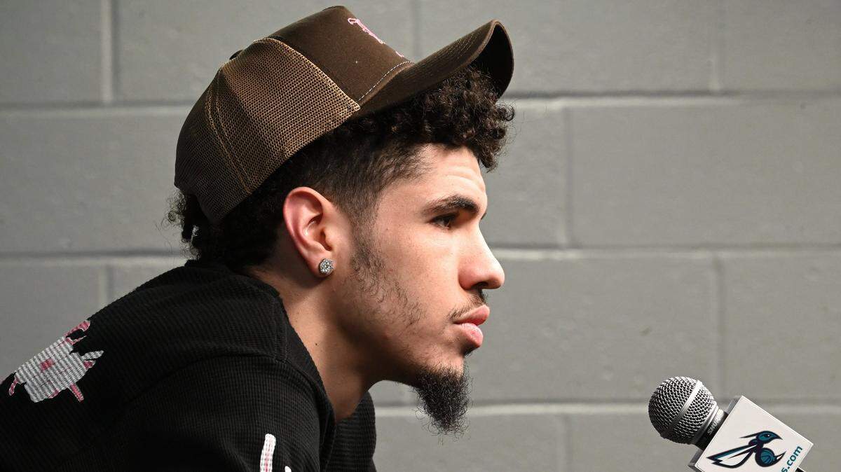Charlotte Hornets guard LaMelo Ball listens to a question during an interview with the local media at Spectrum Center on Monday, April 15, 2024.
