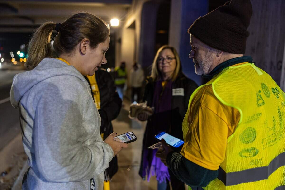 A volunteer group decides on which area to head next  during the 2026 Point-in-Time Count in Charlotte, N.C., on Thursday, January 22, 2026.