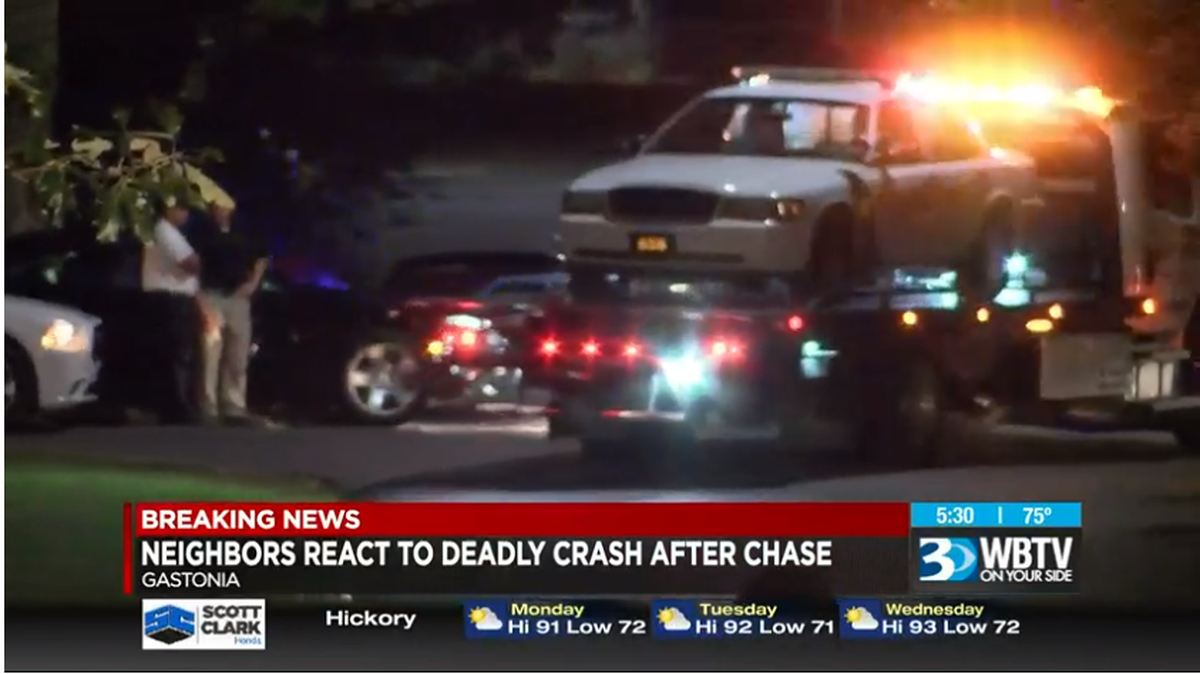 Video screenshot of the police care being hauled away in Gaston County death investigation.