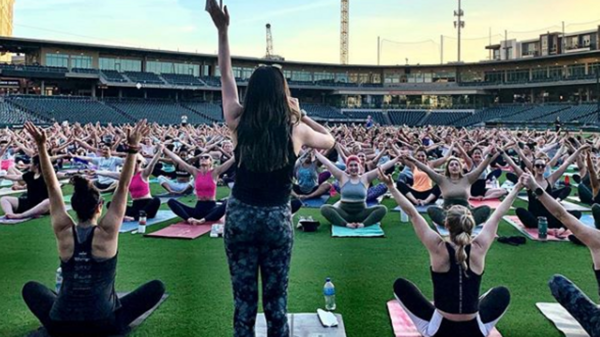 Visit Truist Field on May 2 for Bend It at the Ballpark, a free yoga class to benefit Charlotte Knights Charities.
