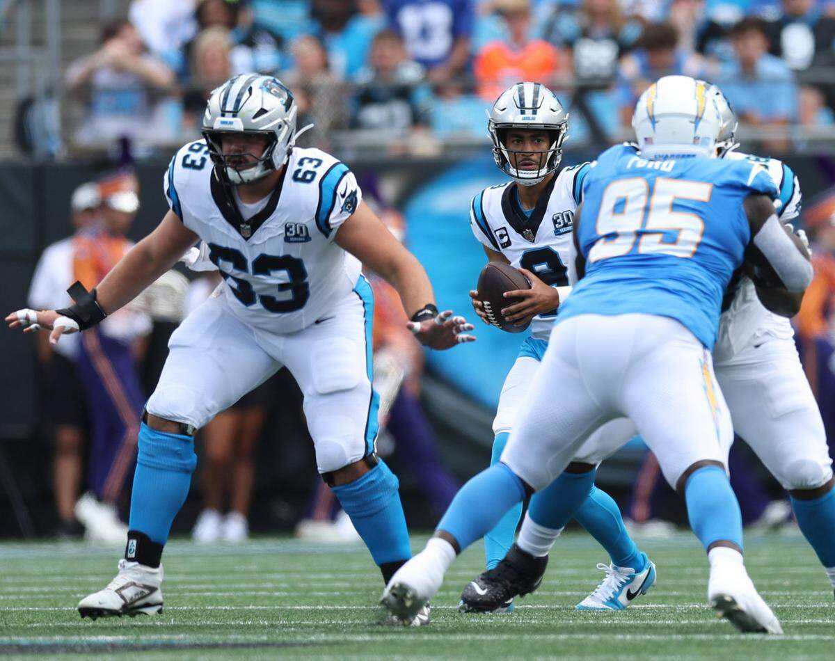 Panthers quarterback Bryce Young scans the field for a pass during the game against the Chargers at Bank of America Stadium in Charlotte, NC on Sunday, September 15, 2024.