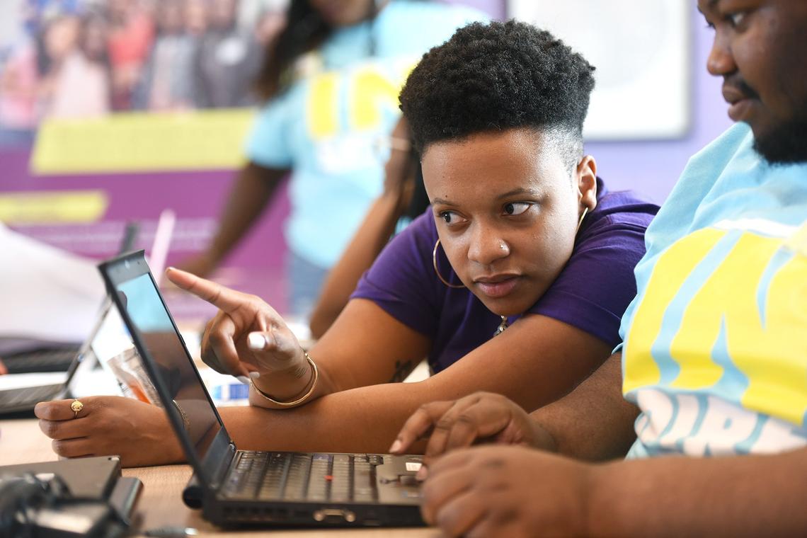 Khalia Braswell and Shuffarel Bonaparte (right), tech mentor and INTech board member, worked with INTech campers.