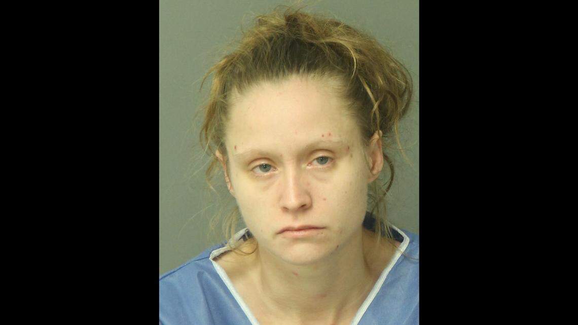 Melissa Anne Godshall, 32, confessed to a federal immigration official that she accepted $12,000, a house and a Lincoln Town Car to marry a man from the country of Georgia looking to skirt immigration laws, court documents show.