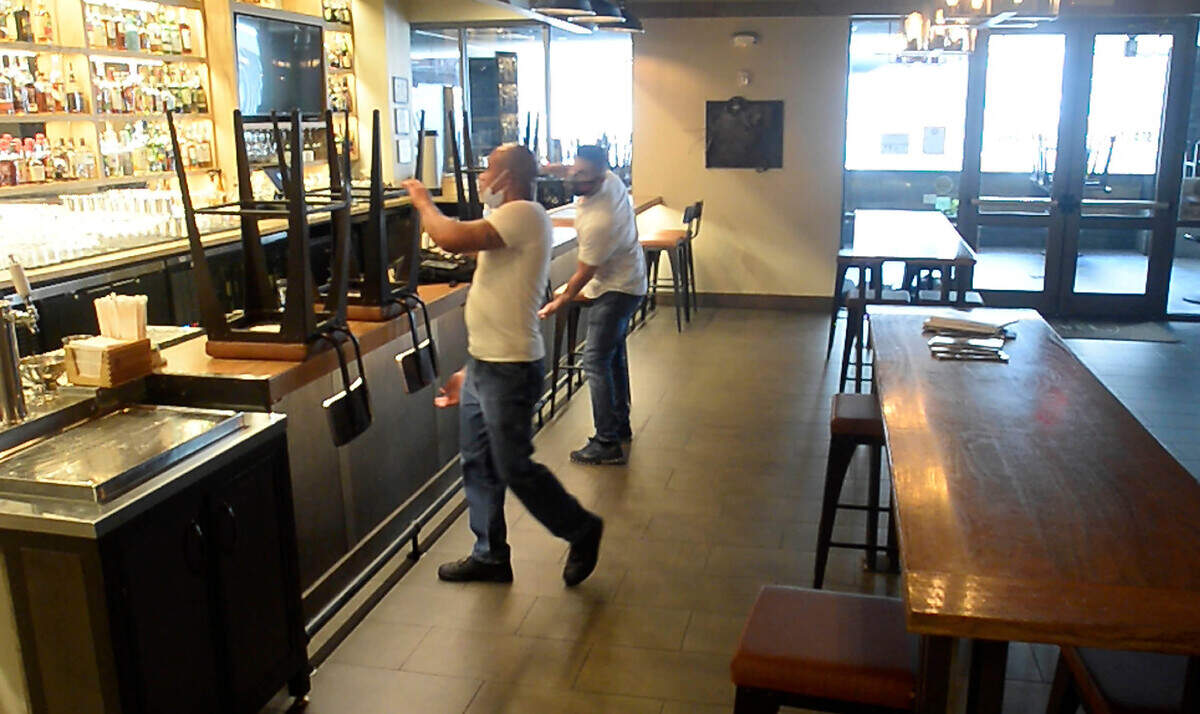 Staff at Sea Level NC restaurant in uptown Charlotte prepare to opening up for the evening on Friday, July 24, 2020. Restaurants uptown are struggling with no events, office foot traffic, and new COVID restrictions on their business.