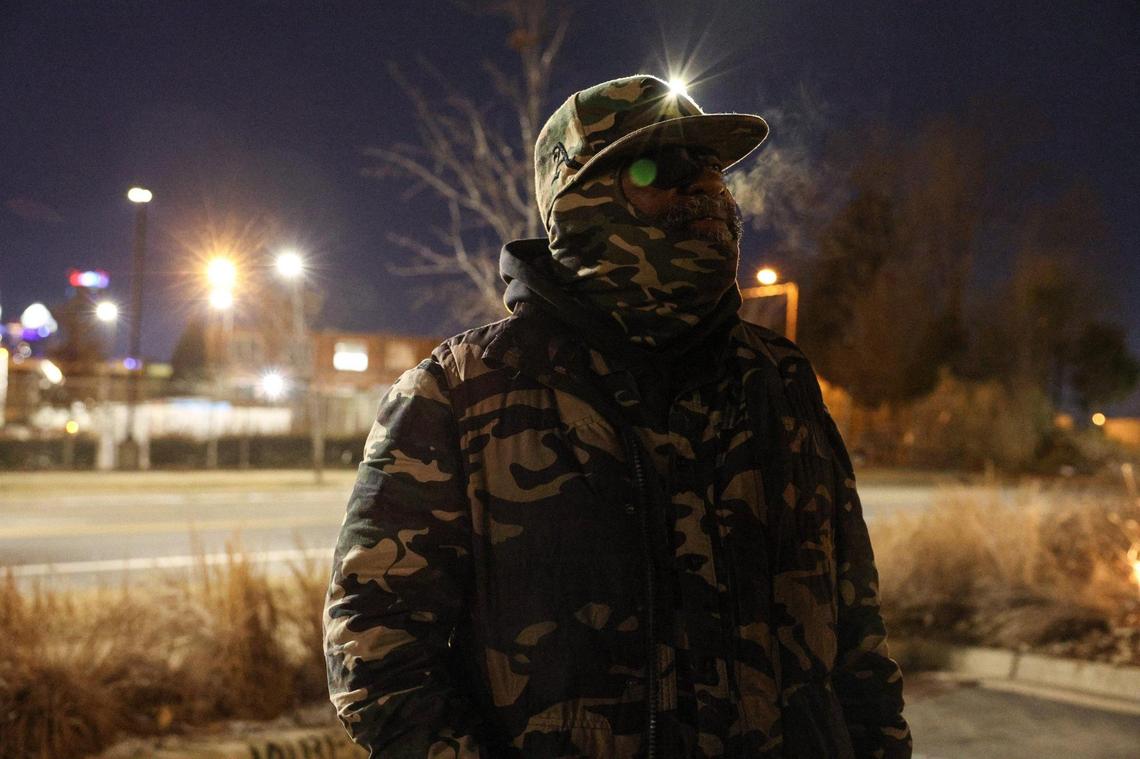 Antonio Williams answers questions about his current living situation during the Point-In-Time Count. Williams lives in an encampment near Camp North End with his wife, Kelly, and their dog.