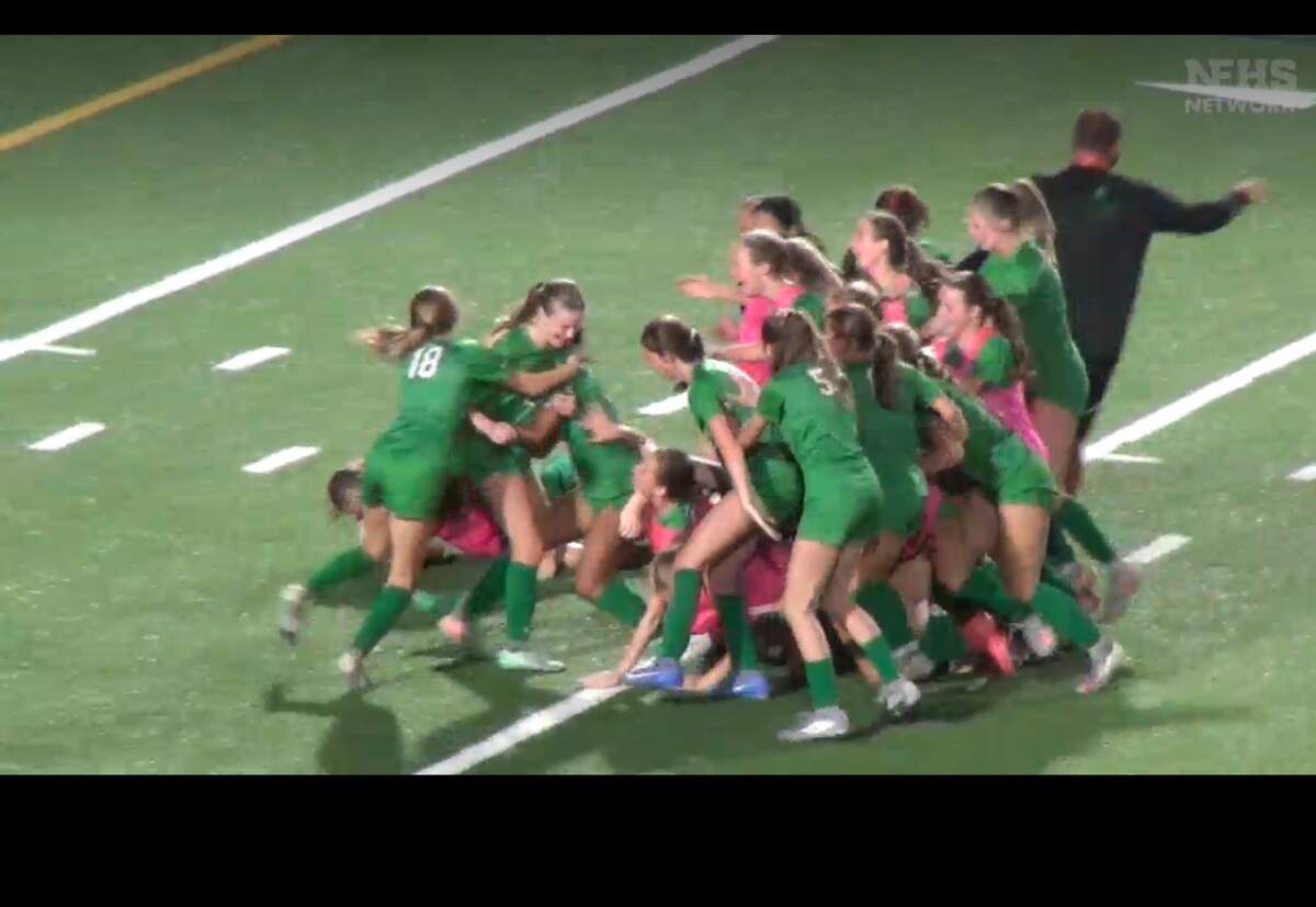 Myers Park’s girls’ soccer team celebrates after beating Wilmington Hoggard in the 2026 NCHSAA 8A girls’ state championship game on Thursday, May 28, 2026.