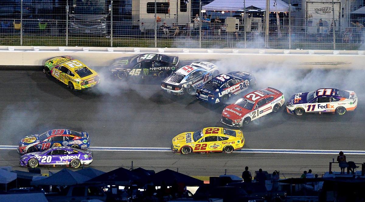 NASCAR drivers Ryan Blaney (12), Kurt Busch (45), Chase Elliott (9), William Byron (24), Harrison Burton (21) and Denny Hamlin (11) wreck going into Turn 2 during the Coca-Cola 600 at Charlotte Motor Speedway on Sunday, May 29, 2022.