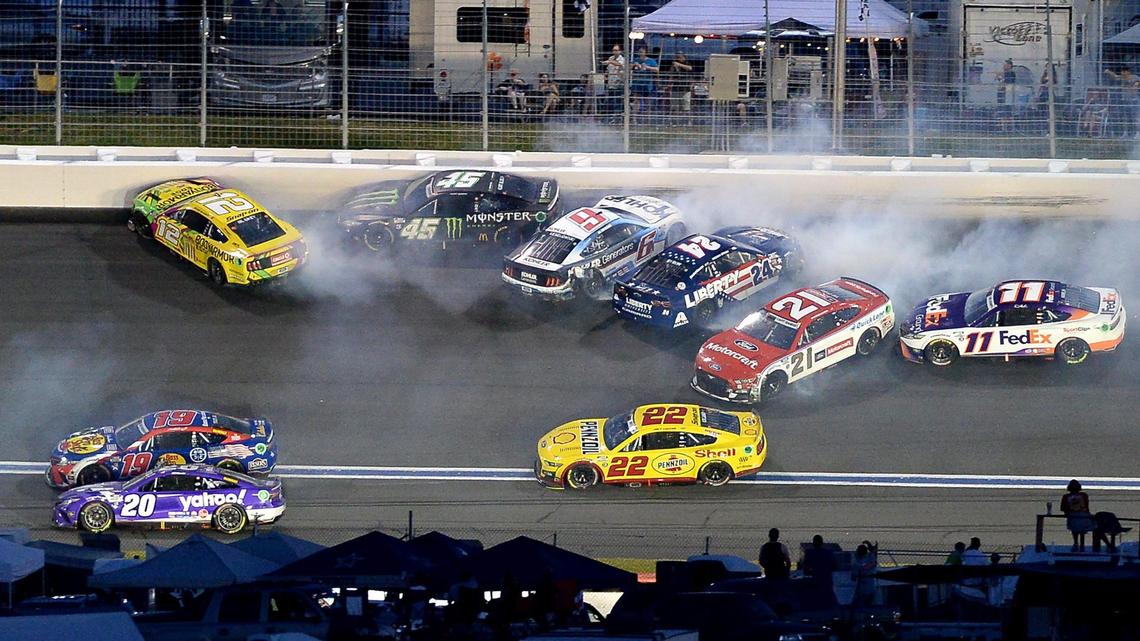 Chaotic Coke 600 race produces wild crashes, big crowds and, at last, a winner