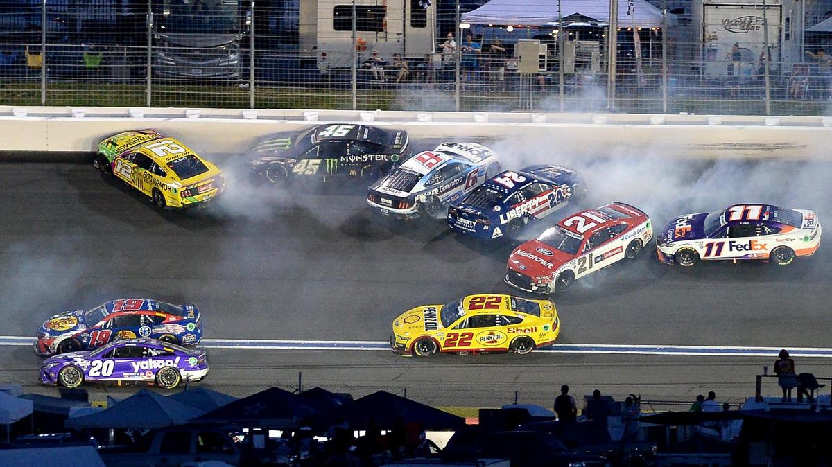 NASCAR drivers Ryan Blaney (12), Kurt Busch (45), Brad Keselowski (6), William Byron (24), Harrison Burton (21) and Denny Hamlin (11) wreck going into Turn 2 during the Coca-Cola 600 at Charlotte Motor Speedway on Sunday, May 29, 2022.