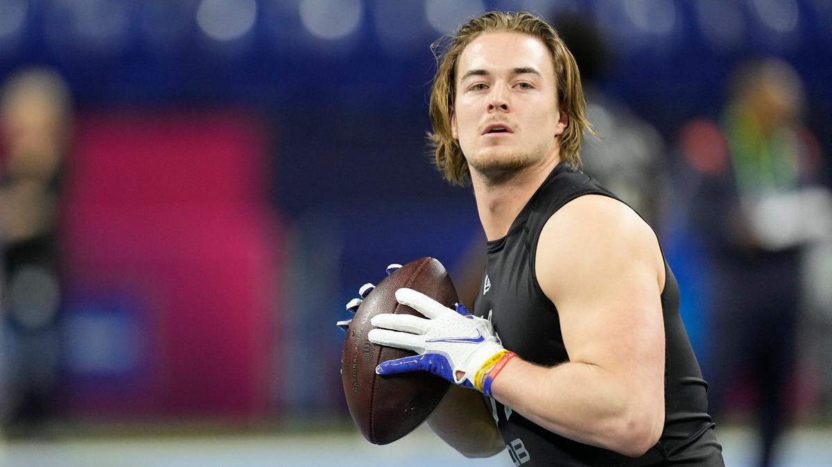 Pittsburgh quarterback Kenny Pickett runs a drill during the NFL football scouting combine, Thursday, March 3, 2022, in Indianapolis. (AP Photo/Darron Cummings)