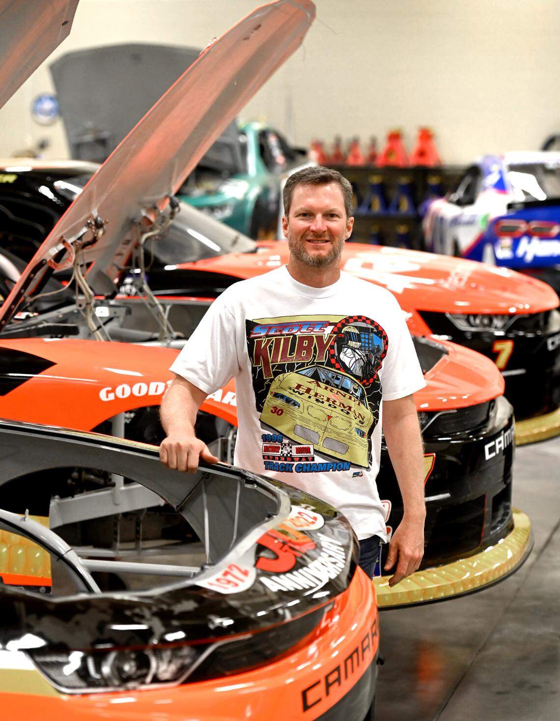 Former NASCAR driver and hall of fame member Dale Earnhardt Jr. poses at his JR Motorsports racing shop in Mooresville, NC.