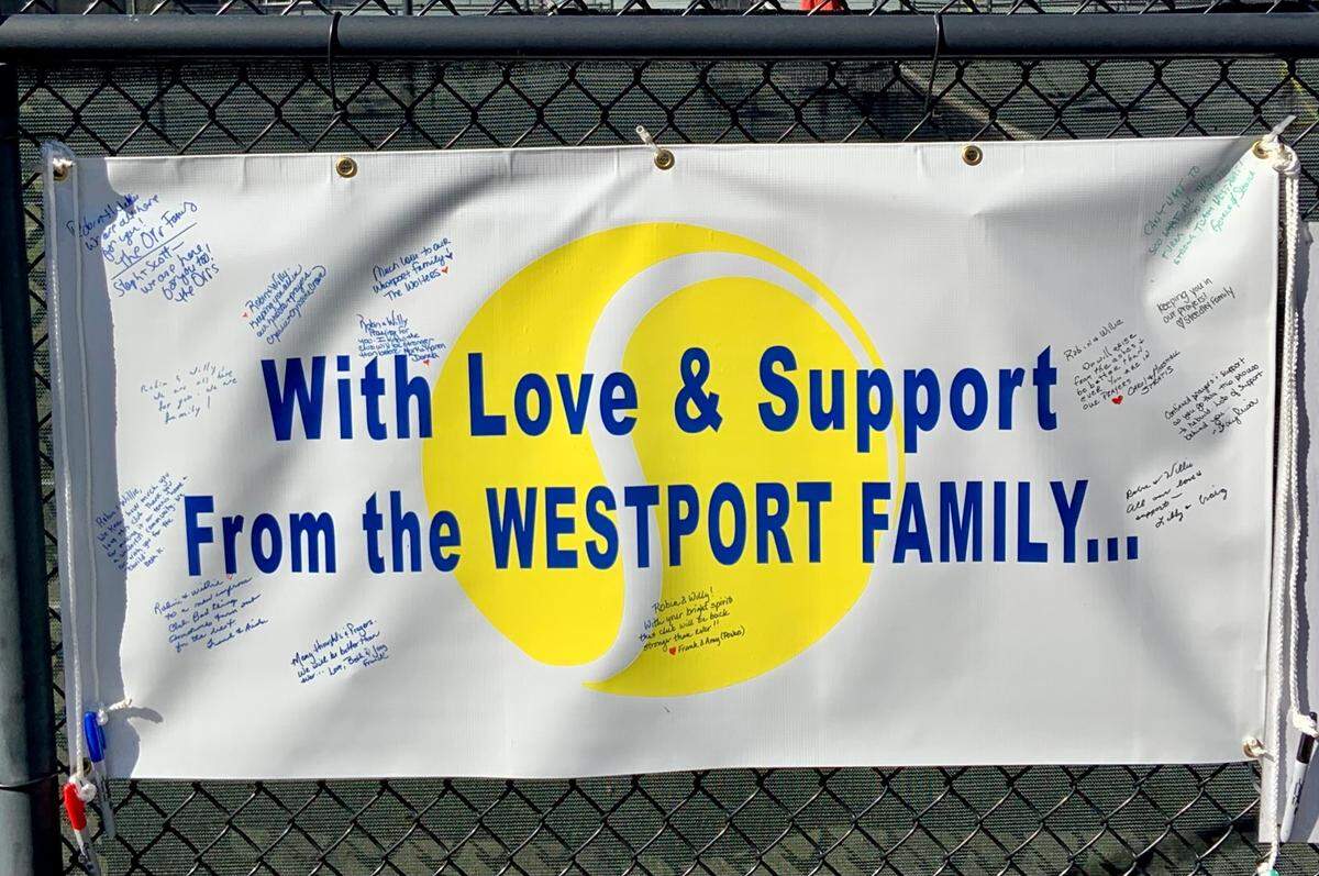 A supportive sign with signatures from some of The Club at Westport’s members was recently tied to one of the fences still left standing in the wake of the Oct. 9th, 2020 fire that burned down the 6,000 square-foot clubhouse.