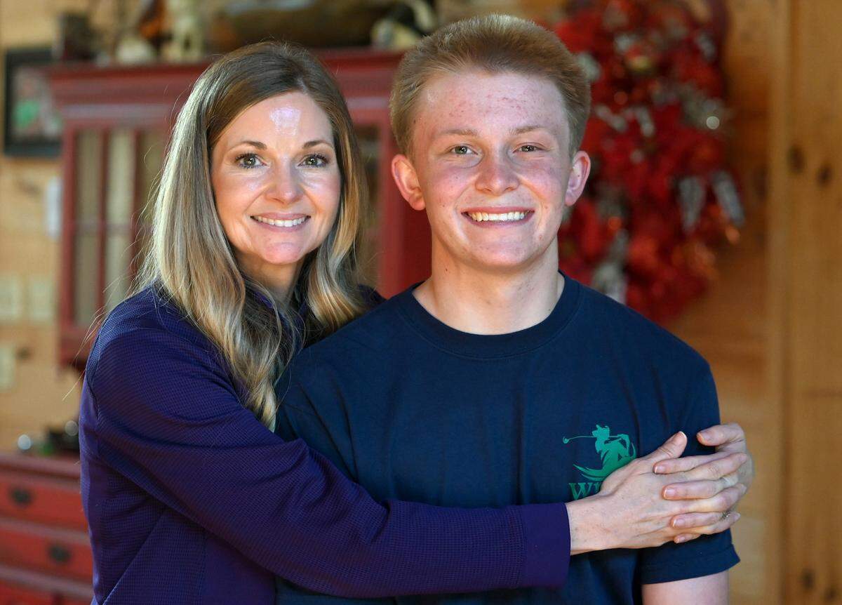 Meredith and Braylon Beam (right) in April. Beam, now 16, was six years old in 2015 and fighting cancer when he inspired many.