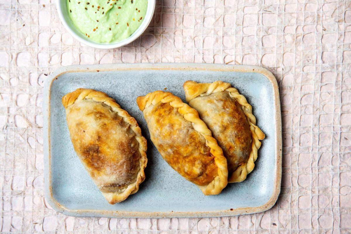 Baked or fried, meat-filled or vegetarian, flour or corn. There are different ways to enjoy empanadas, the tasty Latin American pastry turnovers.