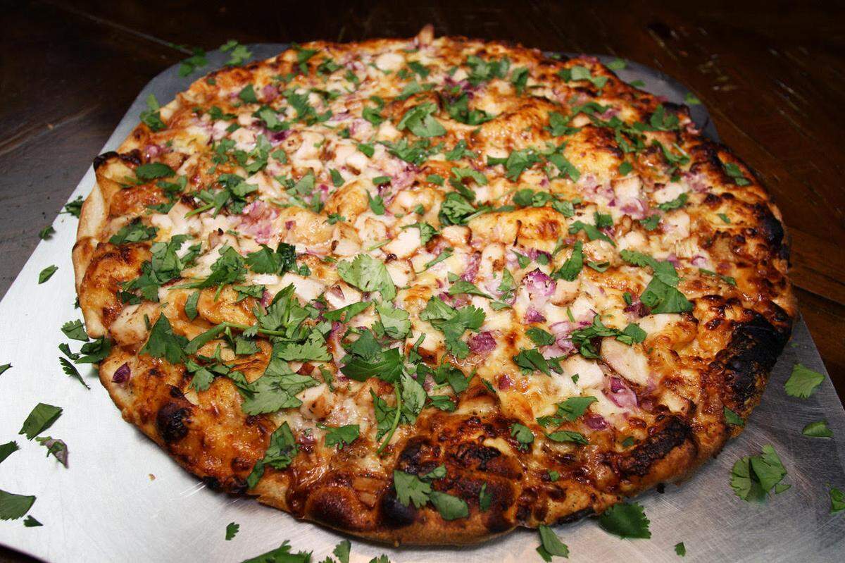 Expect toppings to be loaded edge to edge onto your pizza at The Crust.
