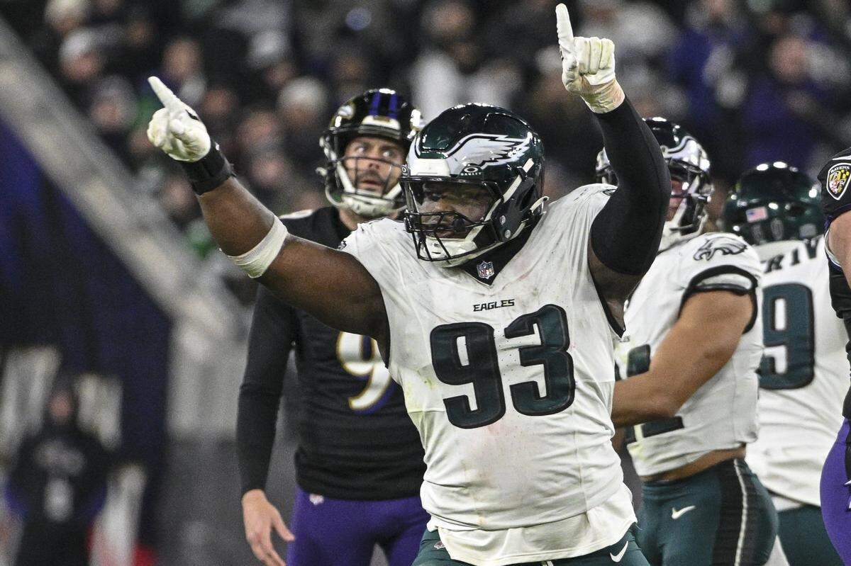 Dec 1, 2024; Baltimore, Maryland, USA;  Philadelphia Eagles defensive tackle Milton Williams (93) celebrates as Baltimore Ravens place kicker Justin Tucker (9) reacts to missing a second half field goal at M&T Bank Stadium. Mandatory Credit: Tommy Gilligan-Imagn Images
