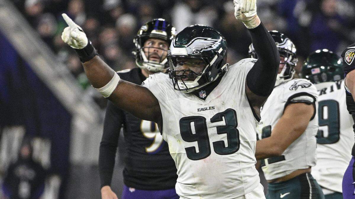 Dec 1, 2024; Baltimore, Maryland, USA;  Philadelphia Eagles defensive tackle Milton Williams (93) celebrates as Baltimore Ravens place kicker Justin Tucker (9) reacts to missing a second half field goal at M&T Bank Stadium. Mandatory Credit: Tommy Gilligan-Imagn Images